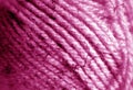 Yarn ball close-up with blur effect in pink color Royalty Free Stock Photo