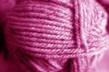 Yarn ball close-up with blur effect in pink tone Royalty Free Stock Photo