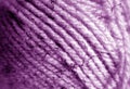 Yarn ball close-up with blur effect in purple color Royalty Free Stock Photo