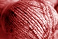 Yarn ball close-up with blur effect in red tone Royalty Free Stock Photo