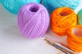 Yarn balls and crochets on the wooden background Royalty Free Stock Photo