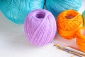 Yarn balls and crochets on the wooden background Royalty Free Stock Photo