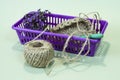 Yarn in the basket. Plastic basket with jute yarn. Crochet a circle of jute rope. Jute twine. Circle crocheted from jute Royalty Free Stock Photo