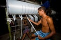 Yarn factory workers are rechecking newly made white yarn at Narsingdi  Bangladesh Royalty Free Stock Photo