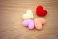 Yarn hearts on wood background Royalty Free Stock Photo