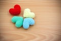 Yarn hearts on wood background Royalty Free Stock Photo