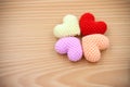 Yarn hearts on wood background Royalty Free Stock Photo