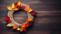 Yarn-wrapped wreath adorned with autumn leaves