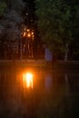 Yaroslavl. Warm evening in Neftyanik Park. Park refinery. Reflection of colorful sunset in the lake. Peace and quiet surrounded by Royalty Free Stock Photo