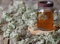 Yarrow.Herbal tea using dried yarrow flowers on a wooden background Royalty Free Stock Photo