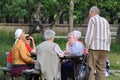 Pensioners communicate on the street