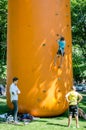 Yarych street Fest 2015. Children compete in climbing on an inflatable hill climbing to the top