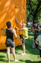 Yarych street Fest 2015. Children compete in climbing on an inflatable hill climbing to the top