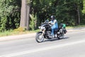 Yaslo, Poland - july 12 2018:The biker rides a stylish chopper on an asphalt road. Cruise on an iron horse. The life style of the