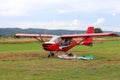 Yaslo, Poland - july 3 2018: Models of airplanes on the airfield stand near the light two-seater turboprop aircraft of red color.