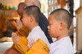 Yasothon, Thailand - 2/21/2015 : 5 Unidentified Asian young boys become a monk