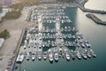 Yatch harbor marina pier and boat dock yatchs and vessels awaiting the open sea. Aerial drone view looking straight down above T- Royalty Free Stock Photo