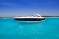 Yatch in turquoise beach of Formentera Royalty Free Stock Photo