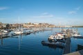 Yatchs moored in Ramsgate Royal Harbour with a view of the town in the background