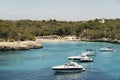 Yatchs in urquoise water in Cala Mondrago view from the sea, Mondrago Natural Park, Majorca Royalty Free Stock Photo