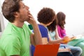 Yawning student during lecture Royalty Free Stock Photo