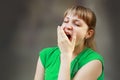 Yawning tired woman Royalty Free Stock Photo