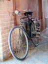 An old bike in a historical passage of Yazd , Iran