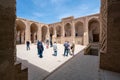 Yazd, Iran - 13.04.2019: People walking in the courtyard of the historical Jameh Mosque of Naein, Yazd province, Iran, very old