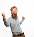 Yeah. Happy winner. Young handsome bearded man gesturing and keeping mouth open. Royalty Free Stock Photo