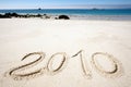 Year 2010 on sand Royalty Free Stock Photo