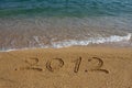 Year 2012 written on the sand Royalty Free Stock Photo