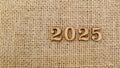 2025 year background on vintage burlap.