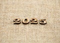 2025 year background on vintage burlap.