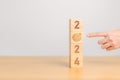 2024 year block with dartboard icon. Goal, Target, Resolution, strategy, plan, Action, mission, motivation, and New Year start