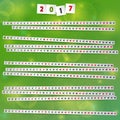 2017 Year Calendar with paper strips on joyful green background. Royalty Free Stock Photo