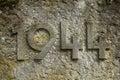 Year 1944 carved in stone. The years of World War II. Royalty Free Stock Photo