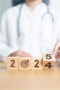 2024 year change to 2025 year block with dartboard icon again doctor. Goal, Target, Resolution, strategy, plan, Action, mission,