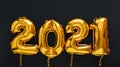 2021 year Christmas gold air balloons on black background. Happy New year 2021 eve. Long web banner Royalty Free Stock Photo