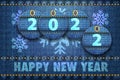 2022 year digits and Happy New Year greetings on blue jeans background Royalty Free Stock Photo