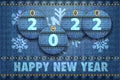 2022 year digits and Happy New Year greetings on blue jeans background Royalty Free Stock Photo