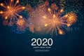 The year 2020 displayed with fireworks and strobes. New year and holidays concept