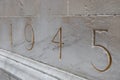 The year 1945 etched into a war memorial