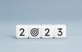2023 year goal concept. White blocks with 2023 number and goal target icon on blue background Royalty Free Stock Photo