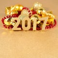 2017 year golden figures on the background of Christmas decorations Royalty Free Stock Photo