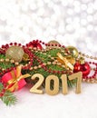 2017 year golden figures and spruce branch and Christmas decorations Royalty Free Stock Photo