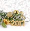 2017 year golden figures and spruce branch and Christmas decorations Royalty Free Stock Photo