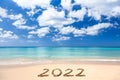 2022 written on sandy beach Royalty Free Stock Photo