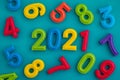 The year 2021 made out of polymer clay numbers with numbers surrounding them