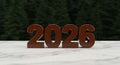 The Year 2026 Marked in Brown Figures on Marble Surface Royalty Free Stock Photo