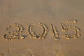 Year 2015 number on sandy beach Royalty Free Stock Photo